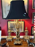 Ornate  brass cherub lamp with prisms