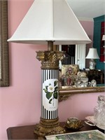 Pair of ornate lamps with flowers