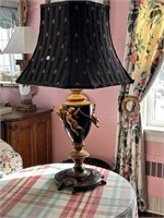 Ornate table lamp with cherubs