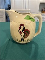 Watt pottery pitcher with rooster