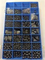 Divider full of hematite beads and charms