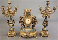 Brevettato Hermle mantle clock with garnitures.