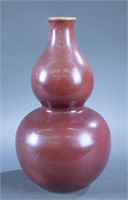 Chinese ox blood double gourd porcelain vase.