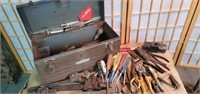 Old metal Craftsman toolbox with several tools,