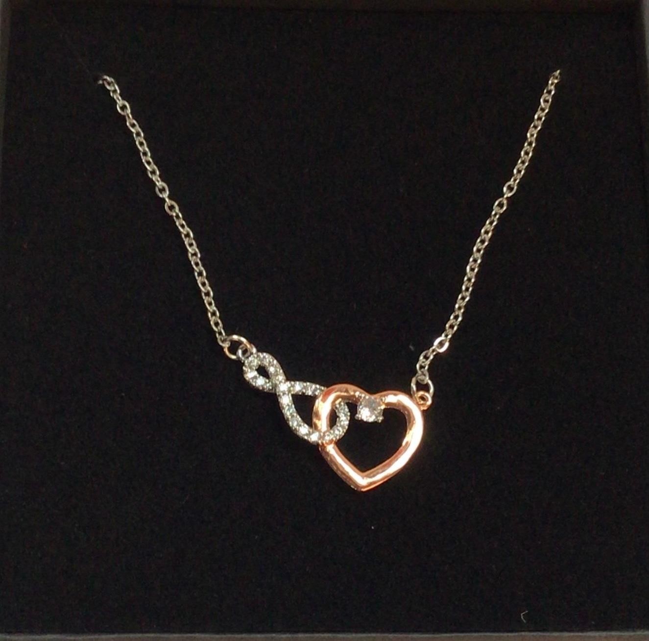 Gorgeous infinity connected to a rose gold heart