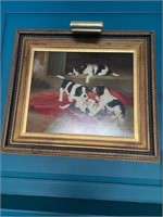Oil on board of puppies with lighted frame