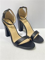 Pair of black Heels Charm size 9M shoes