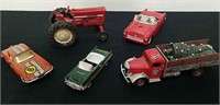Collectible vintage diecast cars and a tractor