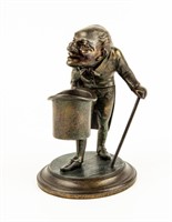 Cast metal Hunchback Man Matchstick Holder