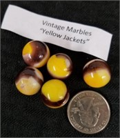 Vintage marbles yellow jackets