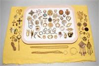 45 MISCELLANEOUS GOLDTONE FASHION BROOCHES