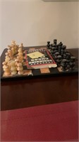 Chess board with pieces and beginning chess plays
