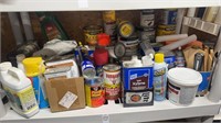 Miscellaneous paint shelf contents of shelf