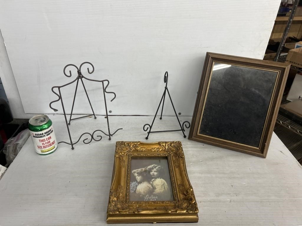 Lot of picture frames and wired display racks