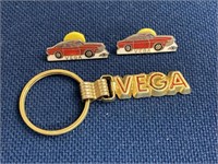 Vintage Vega keychain and Vega lapel pins