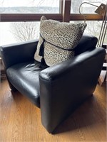 Black Leather Chair with Animal print Pillow