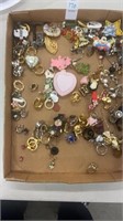 Trey lot of pins, earrings, and brooches