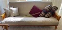 80" Futon Couch Located Enclosed Porch