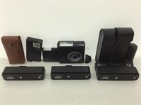 Camera Auto Winders and Speed Flash Attachments.