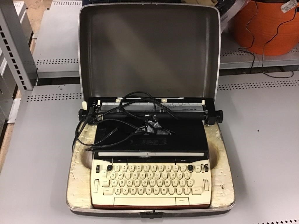 Sears typewriter in case.