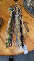 Necklaces, bracelet and mardi  gras beads