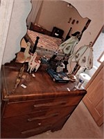Vintage art deco dresser with mirror, items on