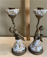 Cherub candlesticks believed to be porcelain and