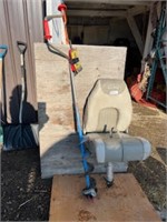 hand ice auger and Lund boat seat