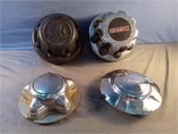 Misc plastic hub caps including Dodge, GMC and