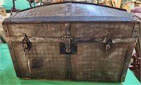 25.5 W x 15H x13 D 1930s humpback trunk made of