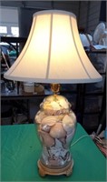 Glass lamp with sea shells. Does work.