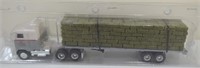 Ertl Cab w/Custom Small Square Bale Load 1/64