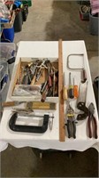C clamp, vise grips, hand saws, pliers, measuring