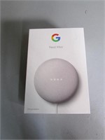 Gray Google Nest Mini Turns on in the box
