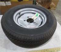 2 Top TW-5 205/70R14 95H tires on rim