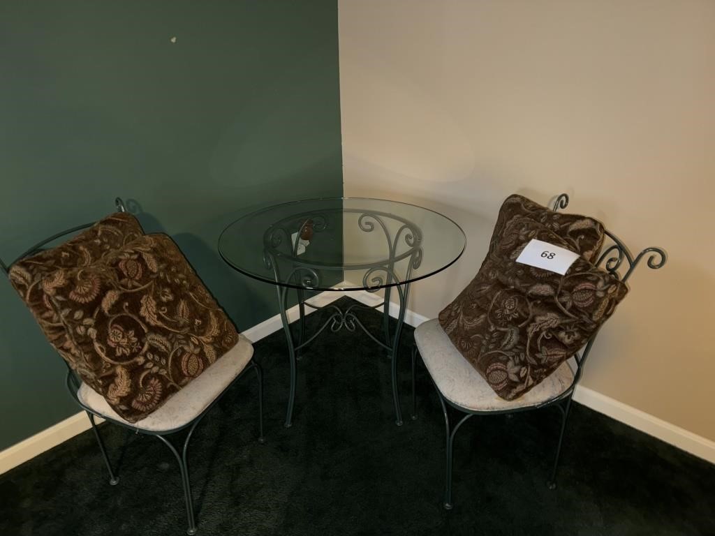 Glass top table, 2 chairs, 4 cushions