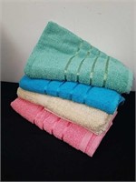 Four new colorful bath towels