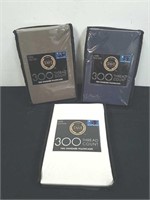 Three new packages of two count standard pillow