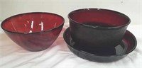 Three pieces of red servingware