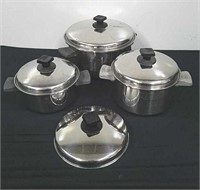 7.5, 8, and 10.5 inch pans with lids and one