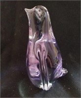 Purple tinted 4.25 inch tall glass paperweight