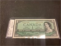 Canada one dollar bill in 1954
