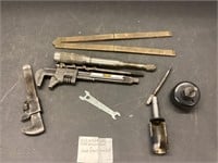 Old wrenches and holesaw’s and bits