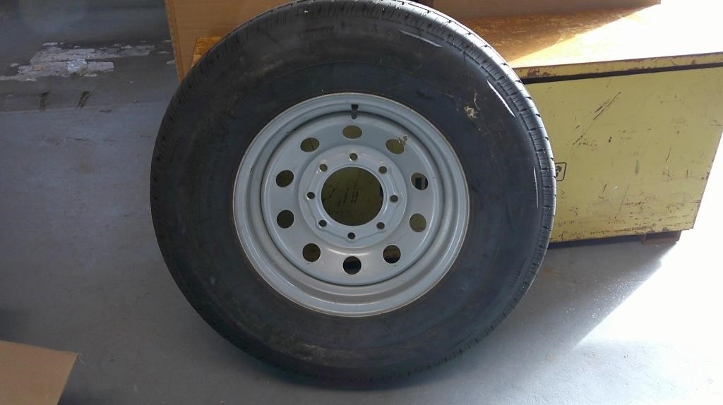 Ranier 235 80 R16 tire and rim