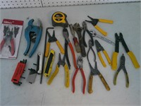 wire strippers, pliers, snap ring pliers