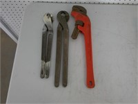 pipe wrench, pliers
