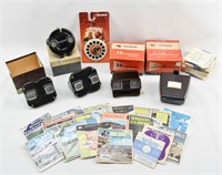 4 Vintage View-Masters, Light Attachment, & Reels