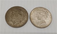 (2) peace silver dollars