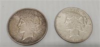 (2) peace silver dollars