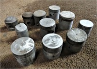 11 Alloy Pistons of Various Sizes.
